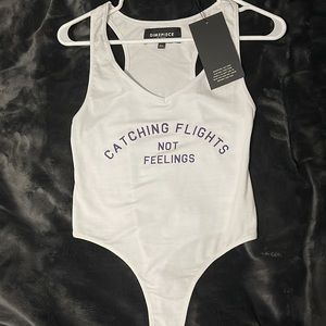 Dimepiece LA bodysuit: catching flights not feelings NWT